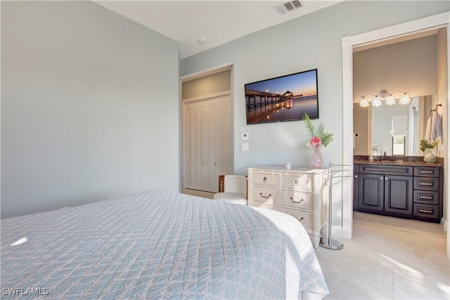 bedroom with visible vents and a sink