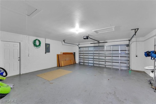 garage featuring electric panel and a garage door opener