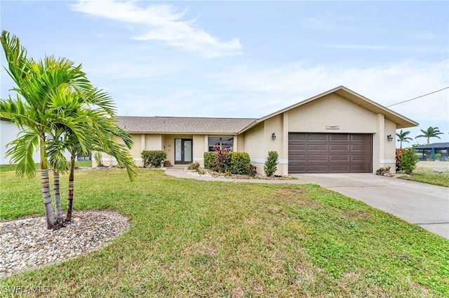 ranch-style home featuring a front lawn and a garage