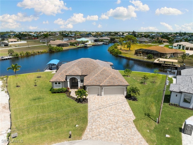 drone / aerial view with a water view