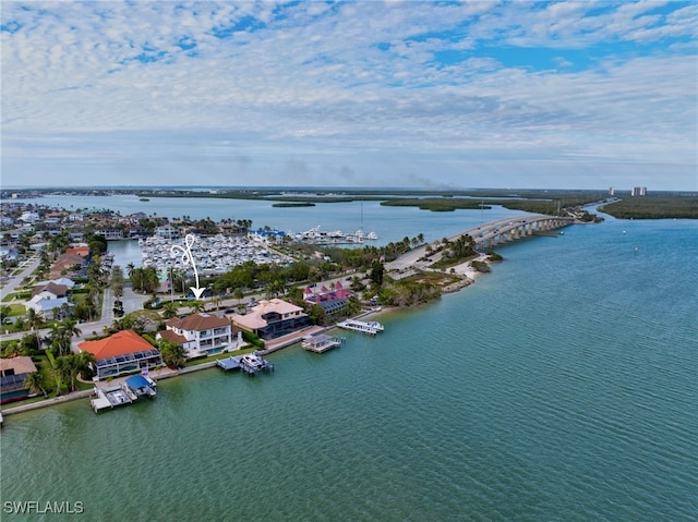 drone / aerial view with a water view