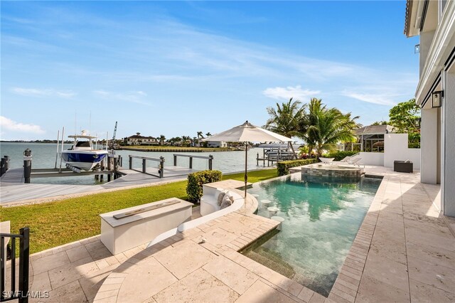 view of swimming pool featuring a patio area, a water view, a dock, and an in ground hot tub