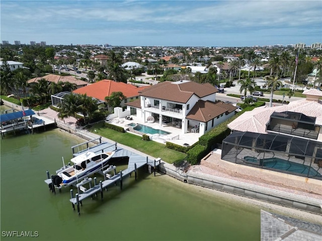 bird's eye view with a water view