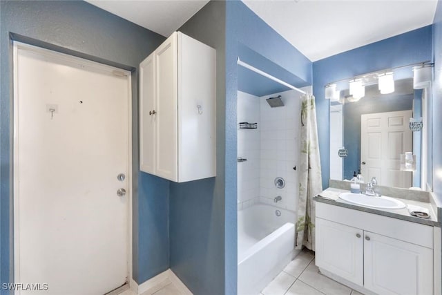 bathroom with tile patterned floors, vanity, and shower / tub combo