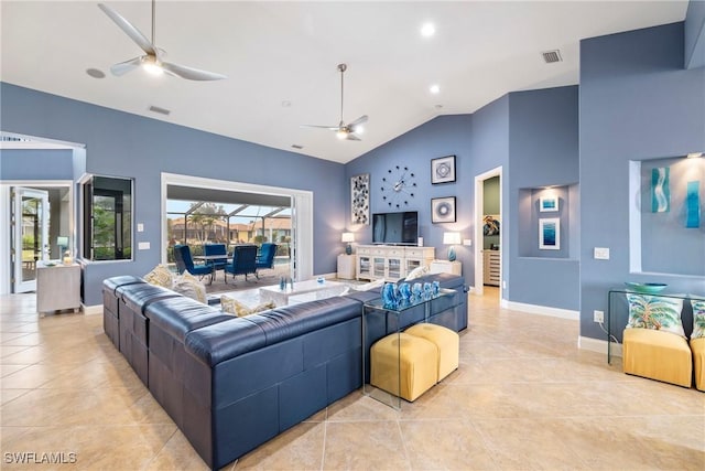 living area featuring a ceiling fan, baseboards, visible vents, and light tile patterned flooring
