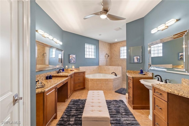 bathroom with ceiling fan, vanity, tile patterned flooring, and independent shower and bath