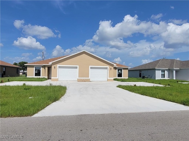 single story home with a garage