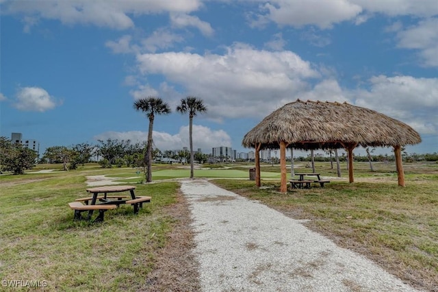 surrounding community featuring a gazebo and a yard