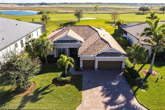 bird's eye view with a water view