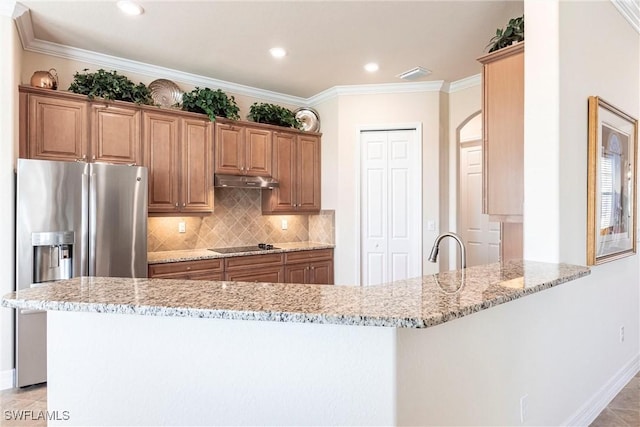 kitchen featuring kitchen peninsula, backsplash, stainless steel fridge with ice dispenser, crown molding, and light stone countertops