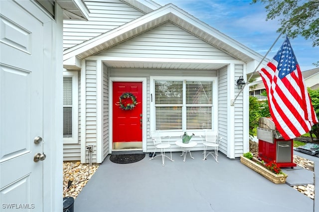 1311 Monarch Cir, Naples, FL 34116 - property entrance with covered porch