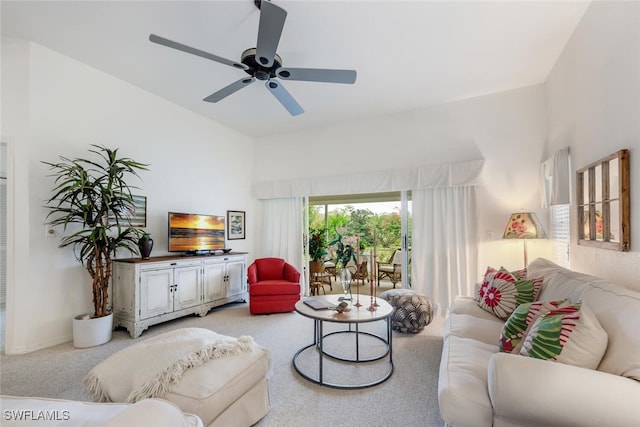 living room with light colored carpet and ceiling fan