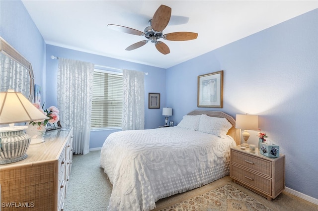 1311 Monarch Cir, Naples, FL 34116 - bedroom featuring light carpet and a ceiling fan