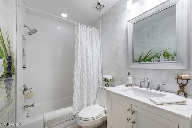 full bathroom featuring toilet, shower / bathtub combination with curtain, and vanity