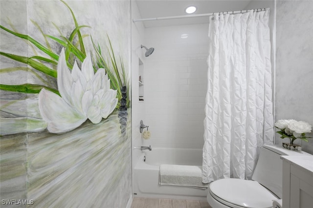 full bathroom with toilet, vanity, and shower / bath combination with curtain