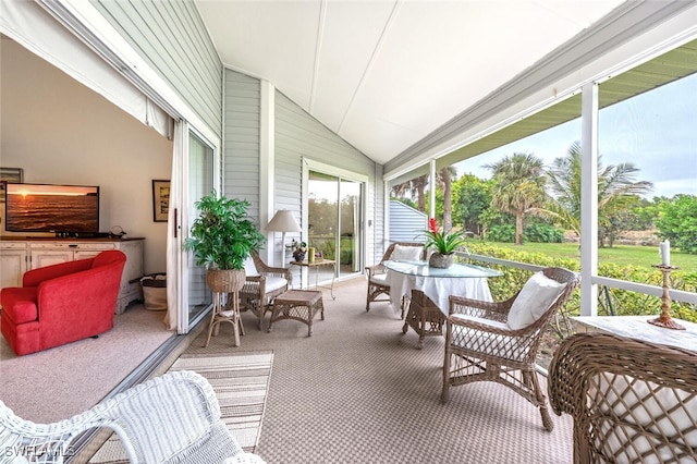 1311 Monarch Cir, Naples, FL 34116 - sunroom featuring lofted ceiling