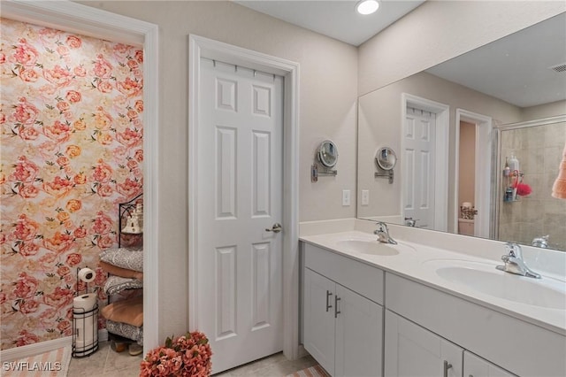 bathroom featuring tile patterned floors and vanity