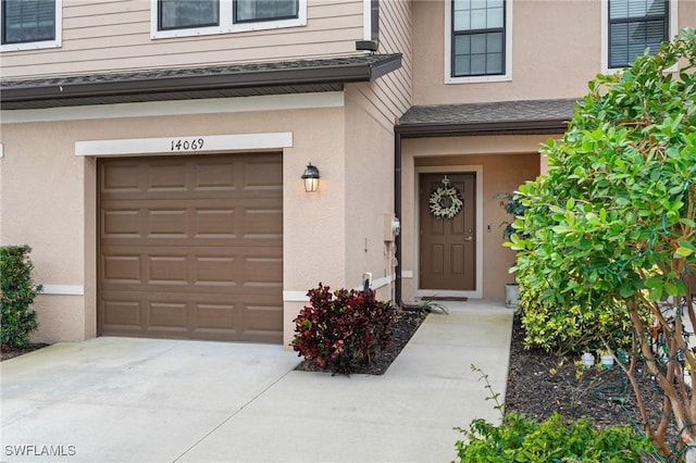 entrance to property with a garage