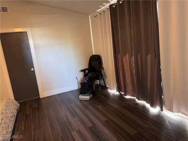 interior space with dark hardwood / wood-style floors