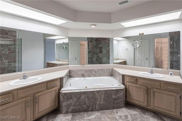 bathroom with vanity and plus walk in shower