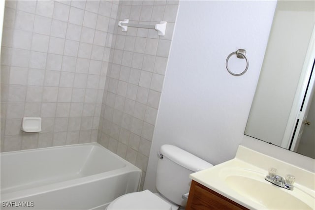 bathroom with toilet and vanity