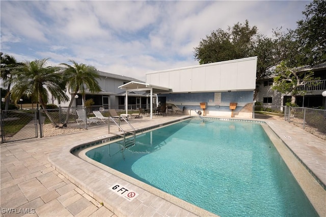 view of swimming pool featuring a patio