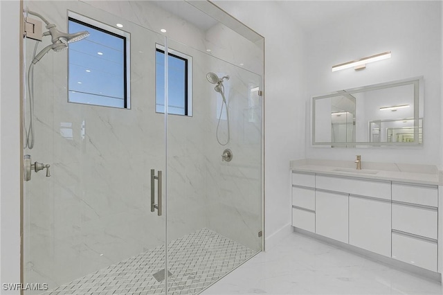 bathroom with vanity and walk in shower