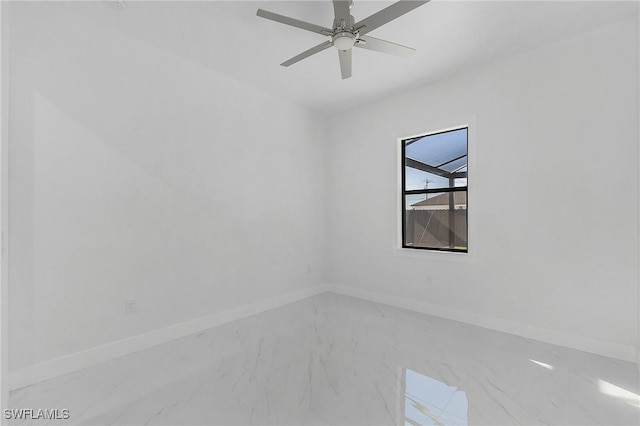 spare room featuring ceiling fan