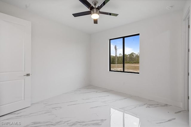 unfurnished room with ceiling fan