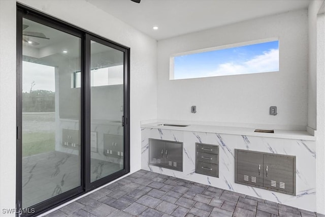 bathroom with ceiling fan