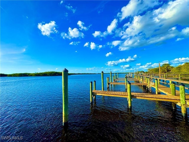 view of dock featuring a water view and boat lift