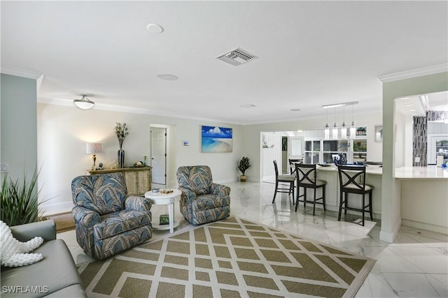 living room with ornamental molding