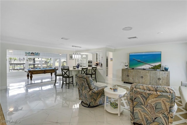 living room featuring ornamental molding and billiards