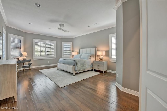 bedroom with ceiling fan, dark hardwood / wood-style floors, and crown molding