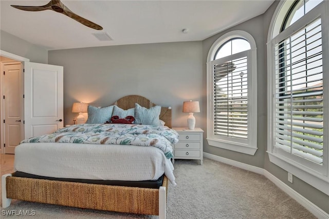 bedroom featuring ceiling fan and carpet floors