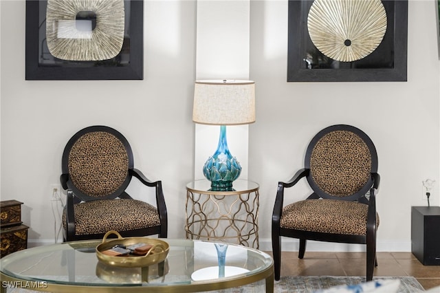 living area featuring tile patterned floors