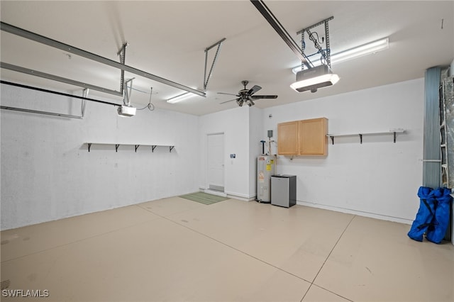 garage featuring water heater and a garage door opener