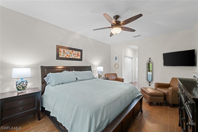 bedroom featuring ceiling fan and hardwood / wood-style flooring