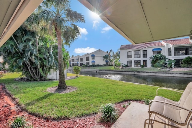 view of yard with a water view