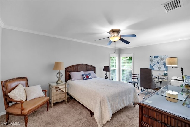 bedroom with crown molding, light carpet, and ceiling fan