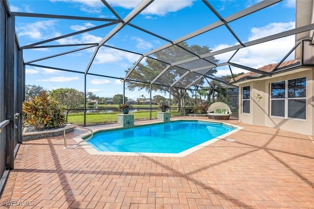 view of pool with a lanai and a patio