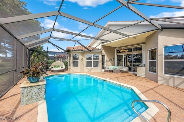 view of pool with a lanai, an outdoor hangout area, and a patio