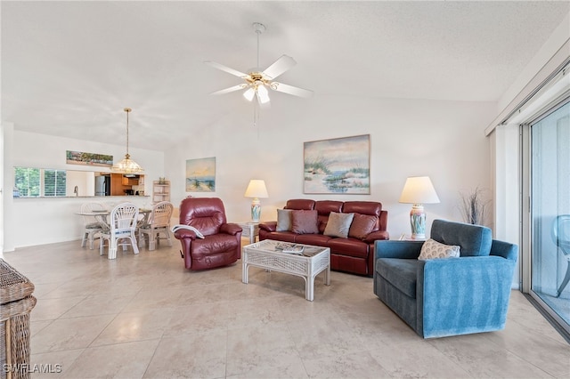 living room with vaulted ceiling and ceiling fan