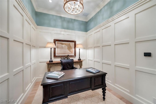 home office with crown molding and an inviting chandelier