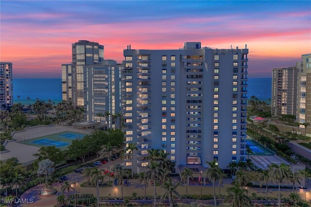 outdoor building at dusk with a water view