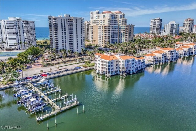 birds eye view of property featuring a water view