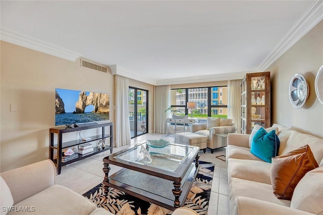 living room featuring light tile patterned flooring, visible vents, and crown molding
