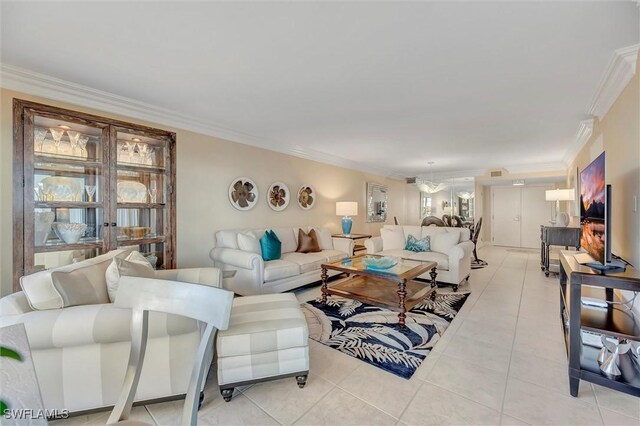 living room featuring ornamental molding and light tile patterned floors