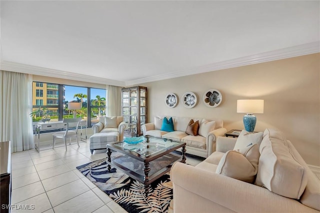 living area featuring ornamental molding and light tile patterned floors