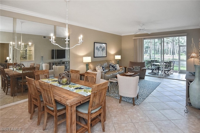 tiled dining area with ornamental molding and ceiling fan with notable chandelier